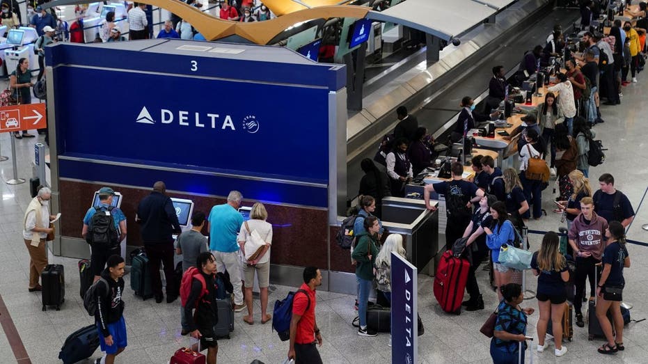 Vacationers at check-in desk